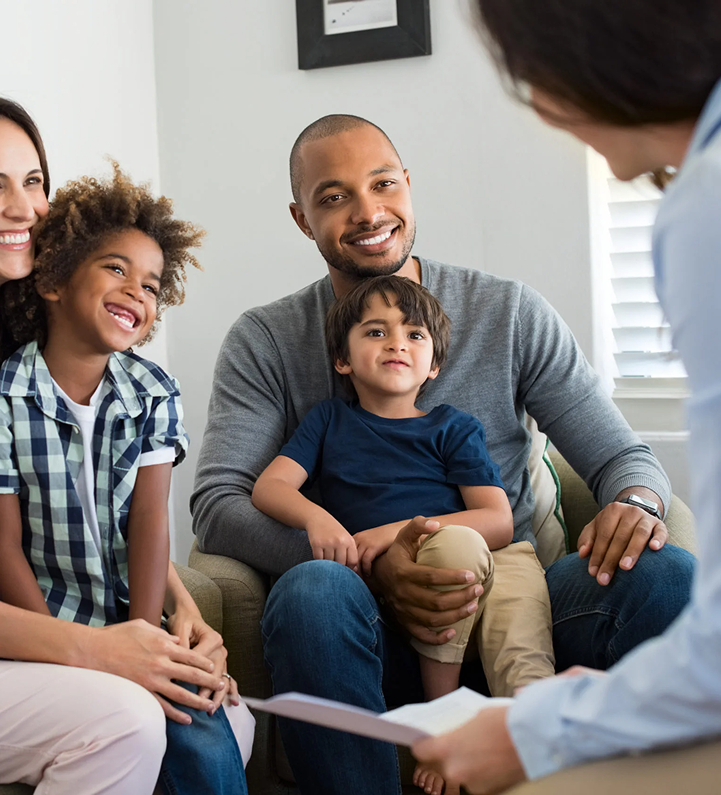 Happy family with children in supportive coaching environment