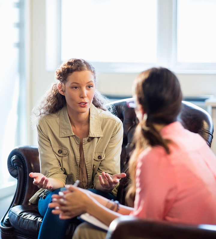 Professional coaching session with woman in modern office setting